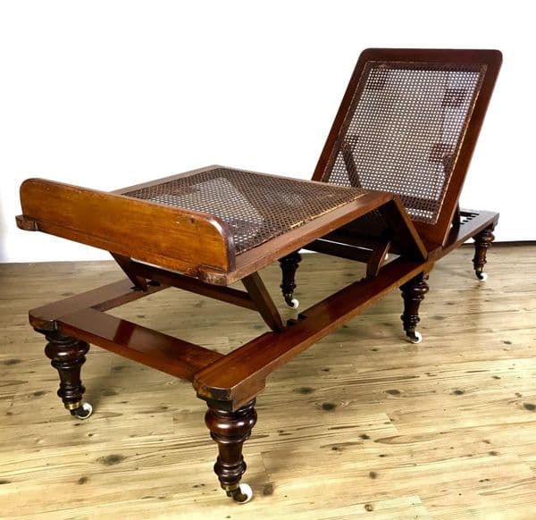 19th Century Walnut Wooden Reclining Lounger With Cane Seat and Ceramic Casters